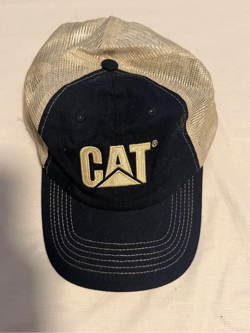 Caterpillar Black and Gold Mesh Trucker Hat